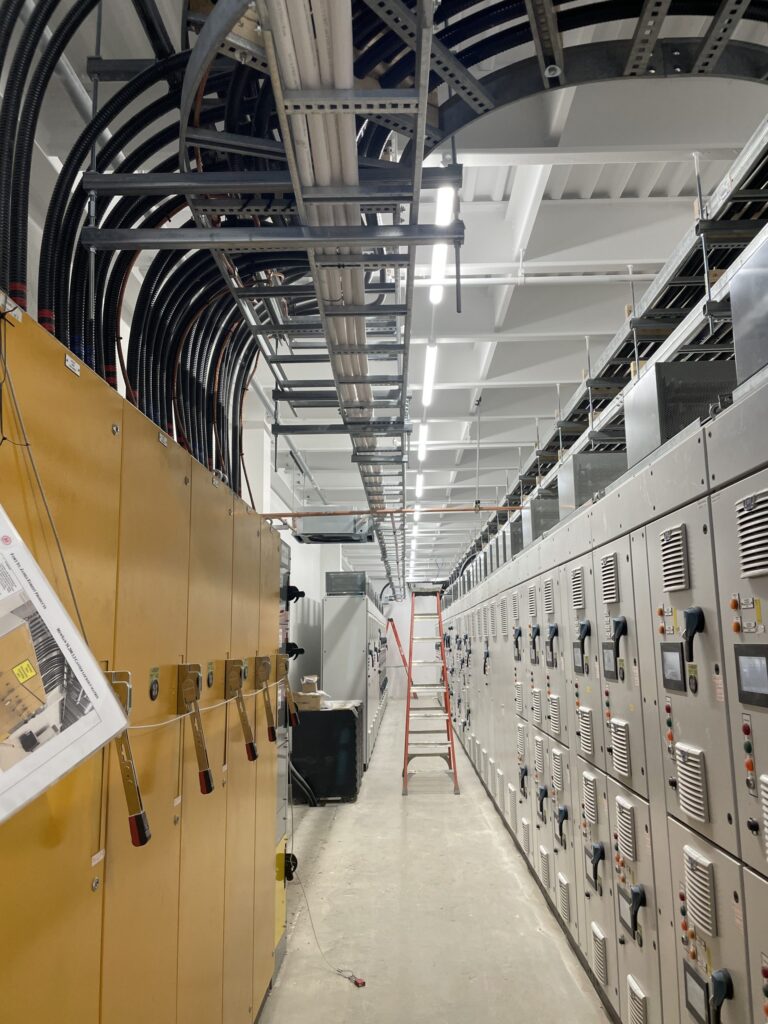 Inside building looking down aisle